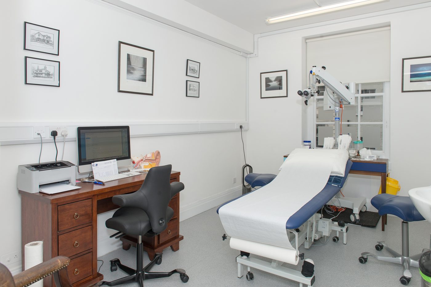 A treatment room at Clear Ear Clinic with the operating microscope